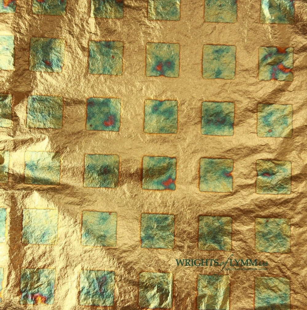 Blue/Green Squares Variegated Copper Transfer Leaf in a booklet containing 25 leaves (140mm). For use in gilding, monumental works, restoration and and art.