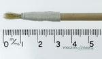 A short, string-bound gesso brush for applying gesso in gilding projects