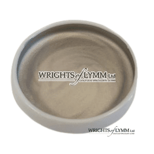 A ceramic pot containing 0.4 gram of platinum shell gold