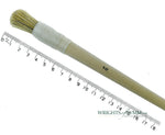 A short, string-bound gesso brush for applying gesso in gilding projects