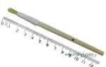 A short, string-bound gesso brush for applying gesso in gilding projects