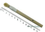 A short, string-bound gesso brush for applying gesso in gilding projects