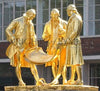 The gilded bronze statue of Matthew Boulton, James Watt and William Murdoch by William Bloye and Raymond Forbes-Kings